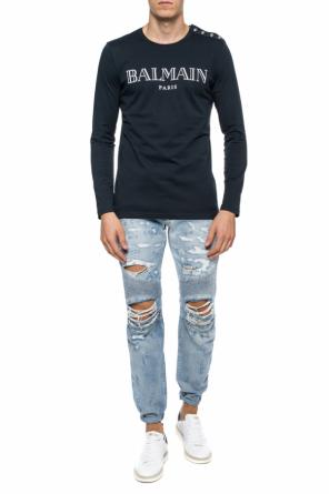Jeansy z dziurami, zdjęcie 2 Jeansy z dziurami od Balmain